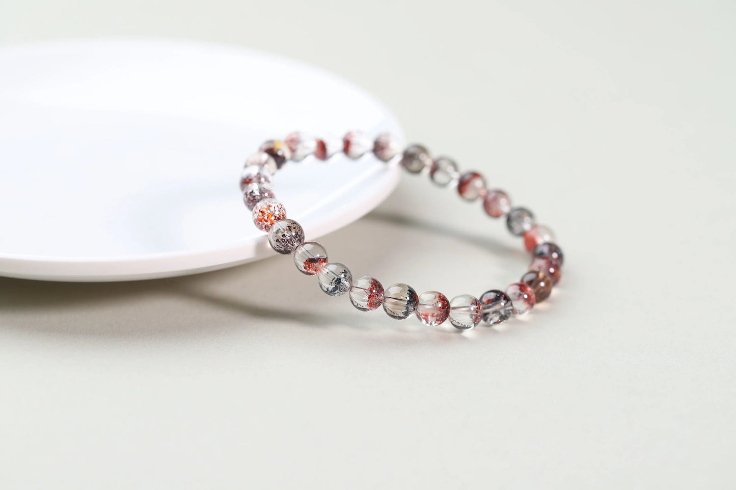 Red Inclusion Quartz Bracelet | Clear Crystal with Fiery Sparks for Vitality, Passion & Grounded Action | Root Chakra Gift BuddhaCrystal