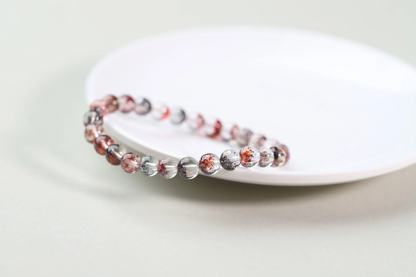 Red Inclusion Quartz Bracelet | Clear Crystal with Fiery Sparks for Vitality, Passion & Grounded Action | Root Chakra Gift BuddhaCrystal