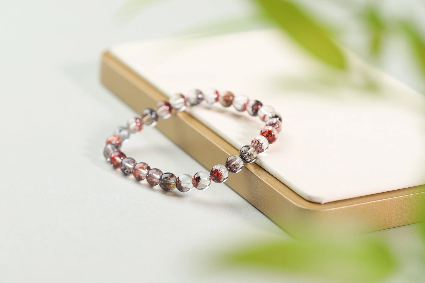 Red Inclusion Quartz Bracelet | Clear Crystal with Fiery Sparks for Vitality, Passion & Grounded Action | Root Chakra Gift BuddhaCrystal