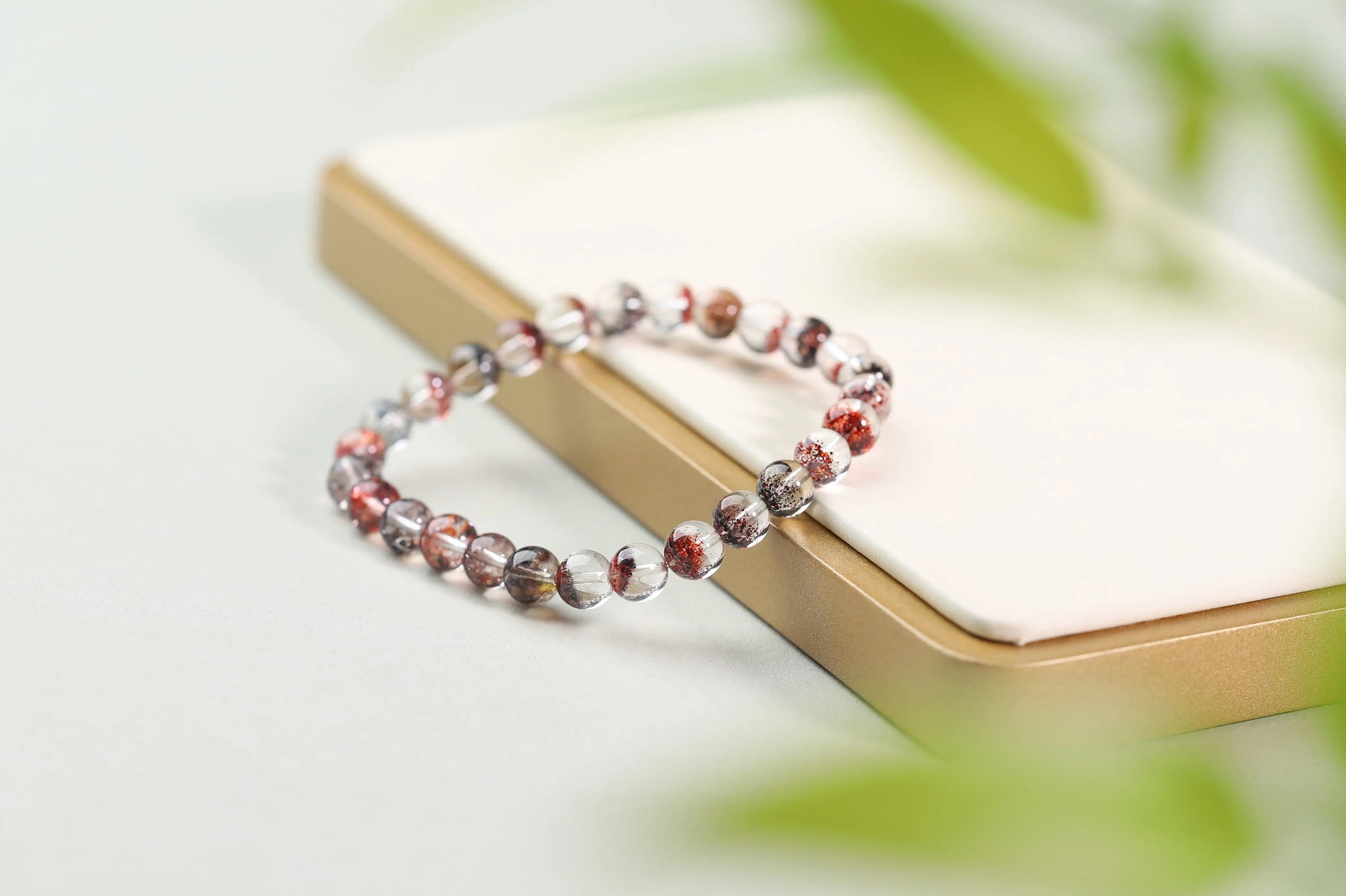 Red Inclusion Quartz Bracelet | Clear Crystal with Fiery Sparks for Vitality, Passion & Grounded Action | Root Chakra Gift BuddhaCrystal