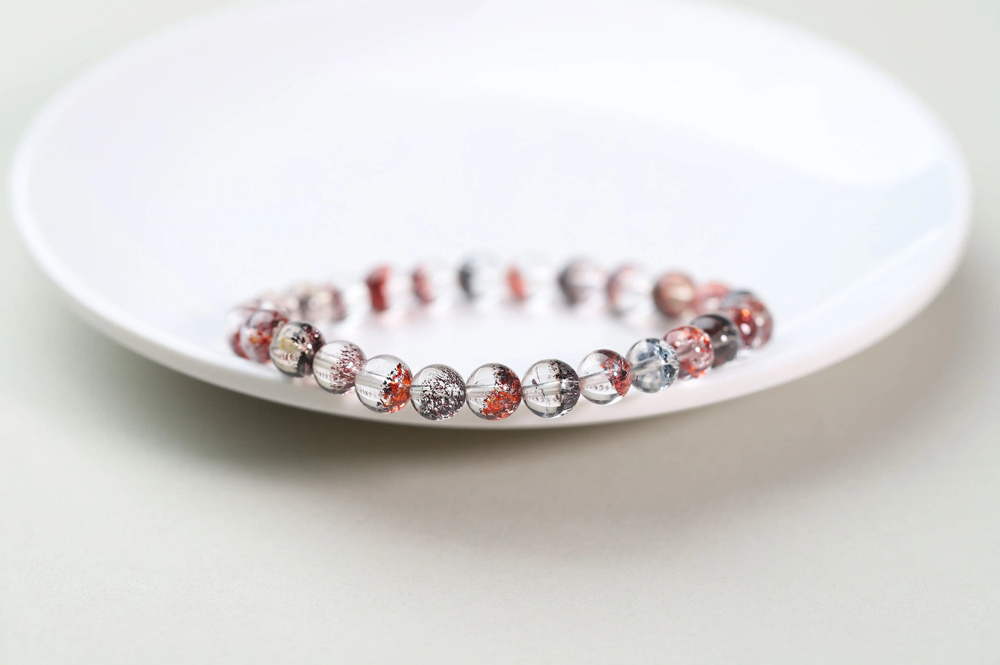 Red Inclusion Quartz Bracelet | Clear Crystal with Fiery Sparks for Vitality, Passion & Grounded Action | Root Chakra Gift BuddhaCrystal